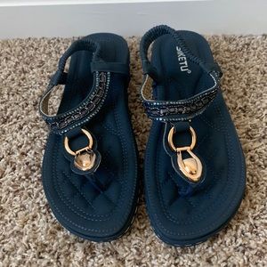 Brand new navy blue padded for comfort sandals